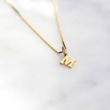 A Brief History of Initial Jewelry